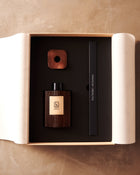 The Maison Ormuth box open, bottle and reed box set in foam